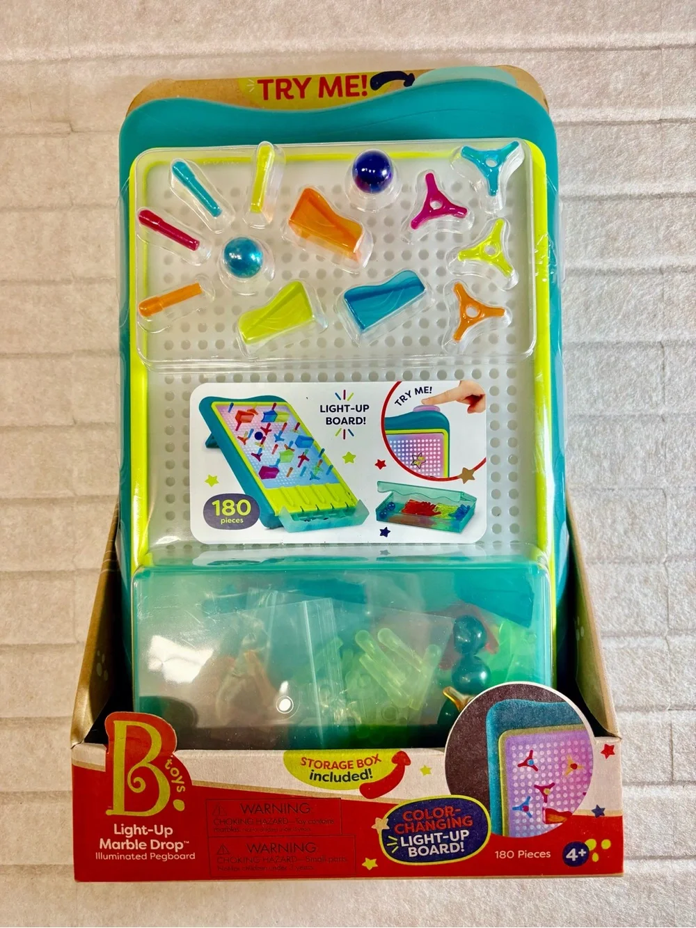 Light-Up Marble Drop Pegboard Toy - Teal Frame with Multicolor Pegs